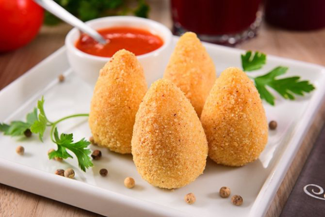 A coxinha é empanada no amaranto e assada. 