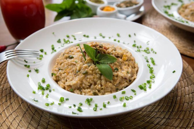 Risoto de siri do Grajagan Náutica na Ilha do Mel. Foto: Divulgação.<br>