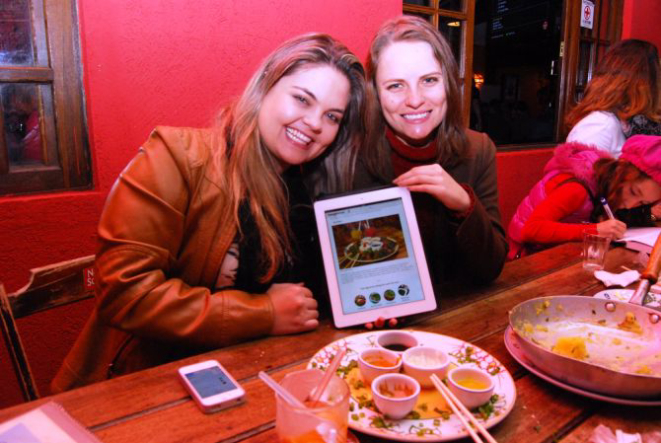 O Quermesse colocou tablets para os clientes votarem. Foto: Divulgação.