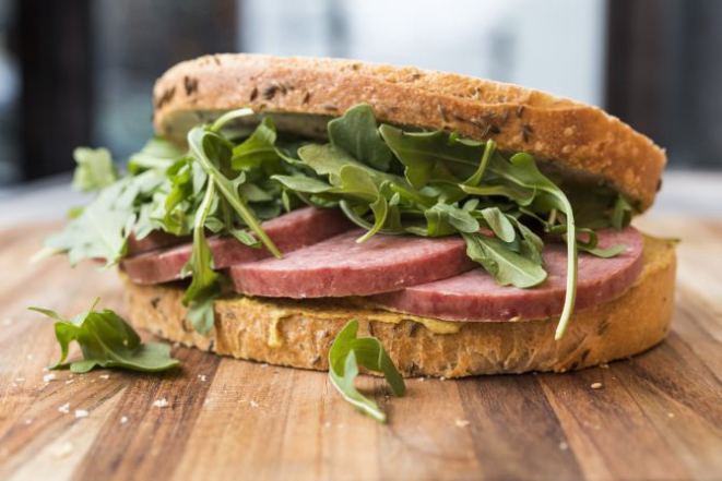 A kosher salami sandwich on rye bread at Orwasher’s Bakery in New York, Dec. 29, 2016. Riding a wave of interest in ancient grains, rye has recently been sprouting in many influential kitchens — in pasta, porridge, brownies, bread and even cooking methods. (Evan Sung/The New York Times)