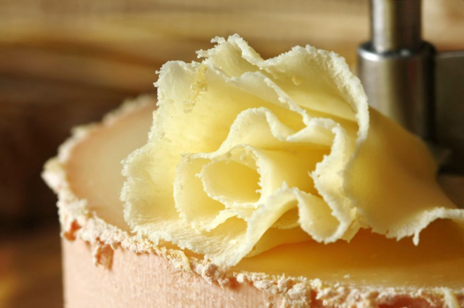 Swiss cheese specialty: Tete de Moine - (macro, shallow DOF)