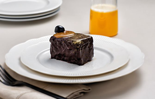 A delicadeza também é retratada nas redes sociais, como a torta chocomelodrama, da Caramelodrama. Foto: Alexandre Mazzo/Gazeta do Povo