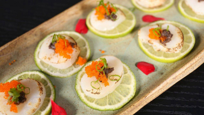 Carpaccio de vieiras canadenses.