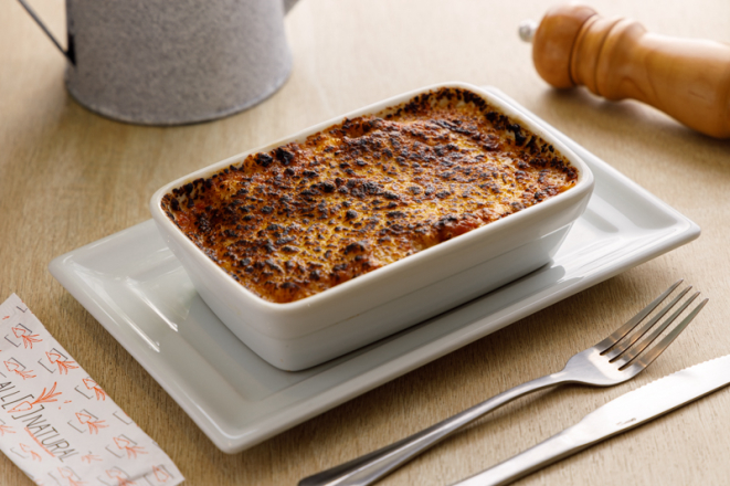 Lasanha vegetariana do All Natural, com lâminas de abobrinhas, creme de ricota, molho pomodoro e parmesão gratinado.