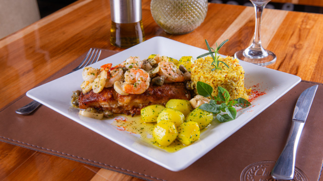 No menu do Churrasco ao Vivo, filé de congrio à belle meunière.