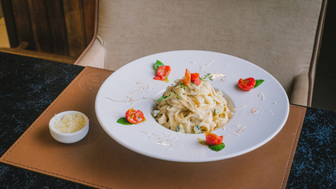 Fettuccine ao molho três queijos do Churrasco ao Vivo.