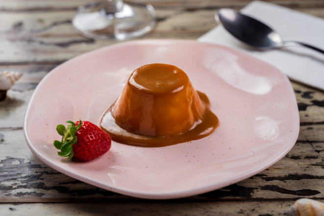 Panacota de baunilha com calda de doce de leite, da Praça do Victor. Foto: Priscilla Fiedler