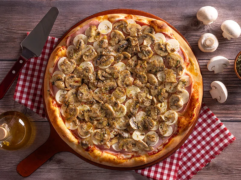 4 Estações - Mussarela, presunto, palmito e funghi paris. Crédito: Baggio Pizzaria e Focacceria