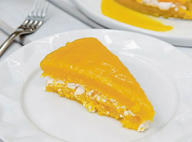 No café, torta encharca da de ovos com merengue. Foto: Fred Kendi/Gazeta do Povo