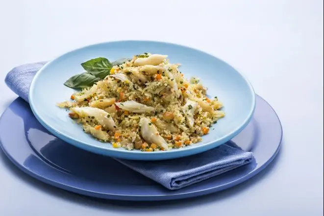 Couscous de bacalhau, da chef Joy Perine. Foto: Letícia Akemi/Gazeta do Povo