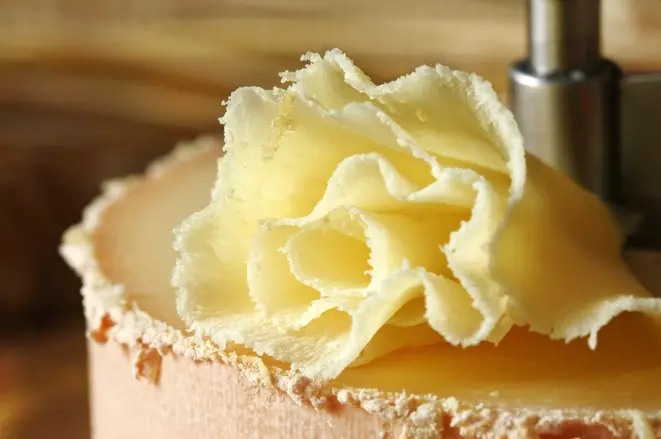 Swiss cheese specialty: Tete de Moine - (macro, shallow DOF)