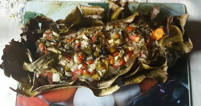 Peixe na folha de bananeira. Foto: Reprodução/Facebook