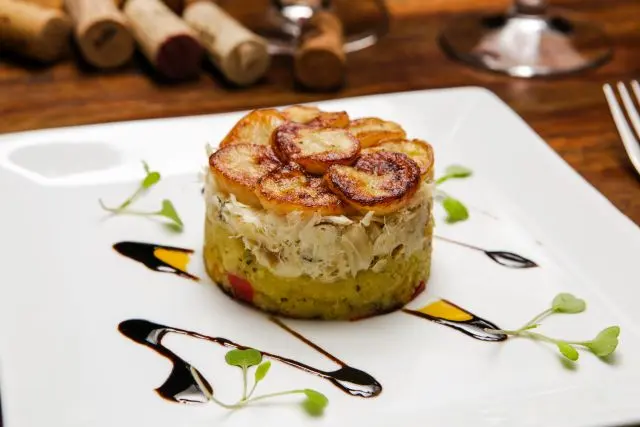 Bacalhau cremoso com farinha d´água, do Vindouro. Foto: Michel Willian / Gazeta do Povo