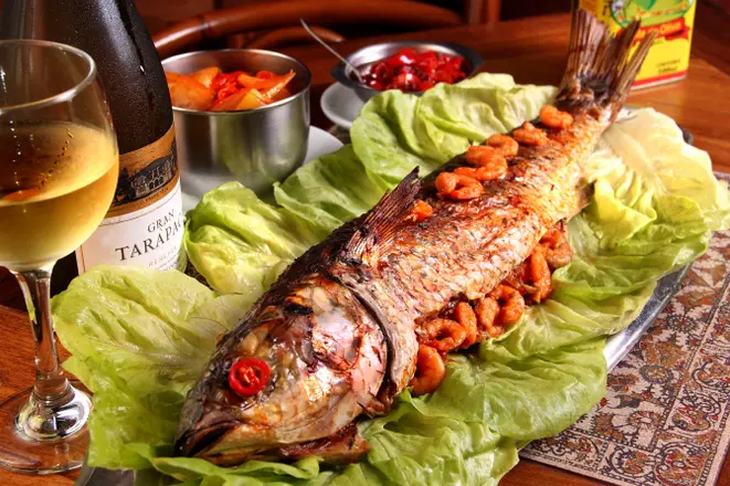Tainha recheada com camarão, do Gambrinus. Foto: Carmem Gamba