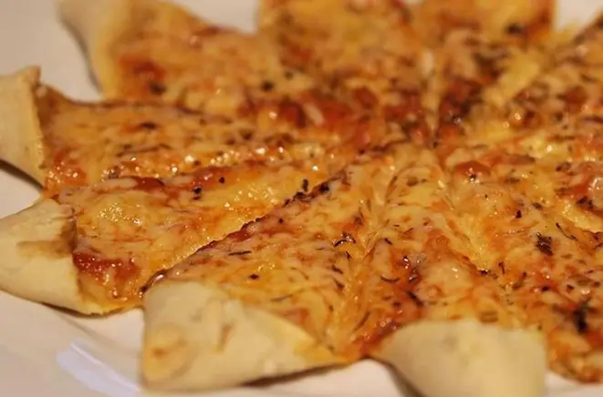 Pizzeta de queijo do wine bar UpStairs. Foto: Divulgação